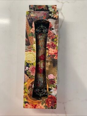 Michal Negrin Floral Cherub Mezuzah - metal with colored rhinestones